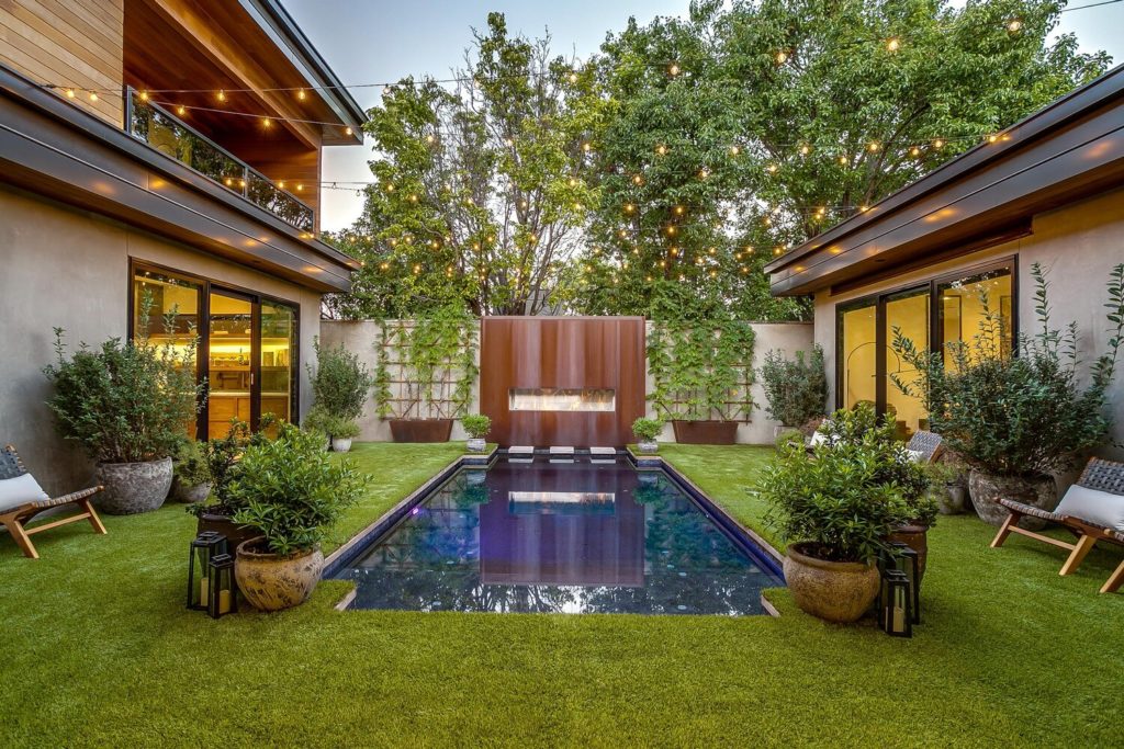 It's an oasis in the heart of the city, with a central courtyard clad in zero maintenance turf.