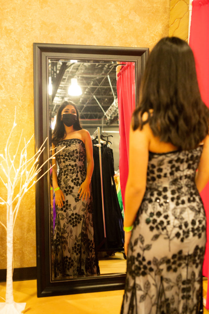 This teenager chooses an embroidered strapless gown for her prom night. (Photo by Sara Blair Design Photography)
