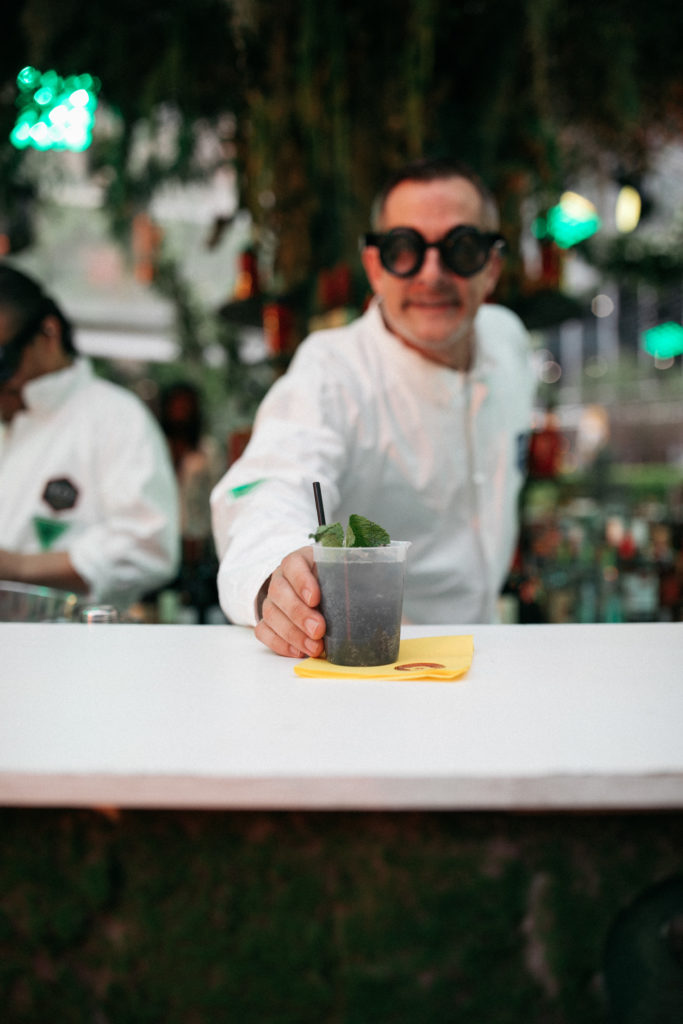 Bartenders served drinks from scientist's tongs (Photo by Beckley & Co)