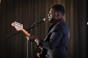 Abraham Alexander performing for UNICEF guests. (Photo by Kim Leeson)