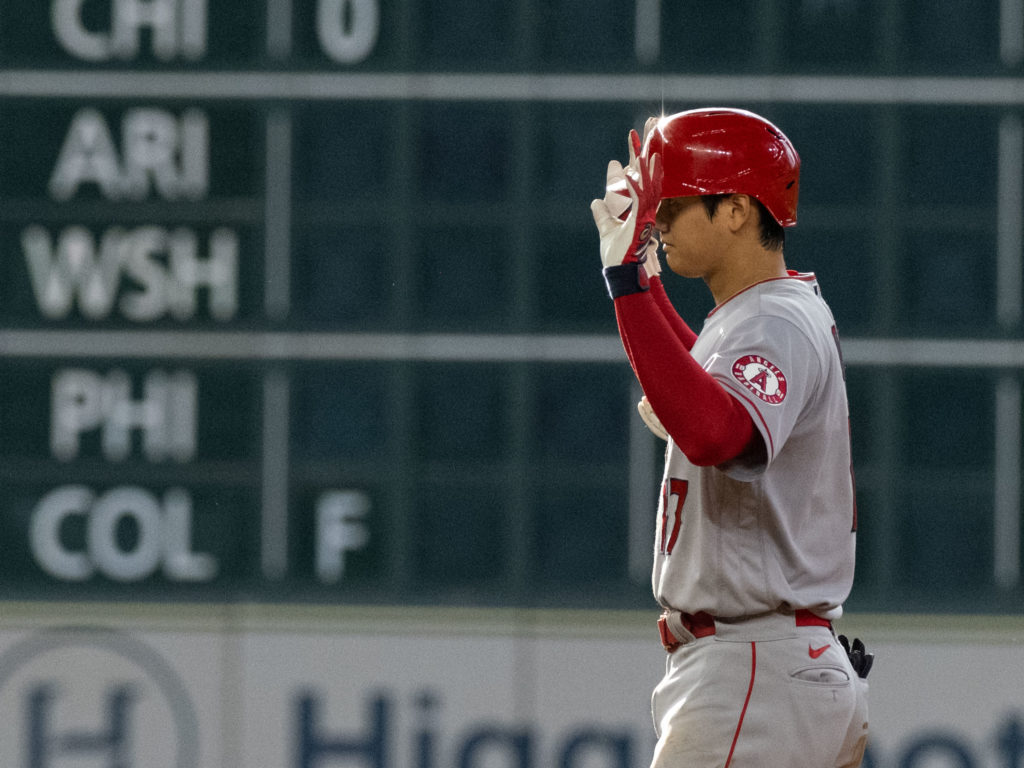 Shohei Ohtani got his uniform dirty, batted twice — and then started striking out Astros. (Photo by F. Carter Smith)