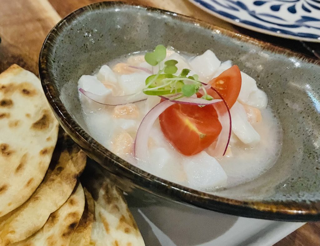 Ceviche El Porvenir soaks in its tiger's milk bath. Photo by Courtney Dabney.