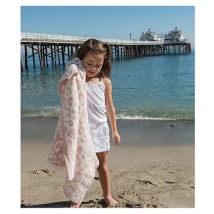 The Barefoot Dreams Dusty Rose Wild Blanket is a coveted baby gift that can be found at Bering’s.