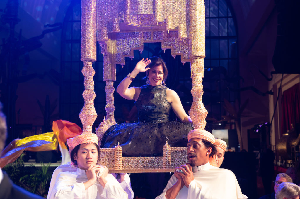 Opera Ball chair Jennifer Fink arrives in the Grand Foyer of Wortham Theater Center in a traditional Moroccan bridal carriage (Photo by Wilson Parish)