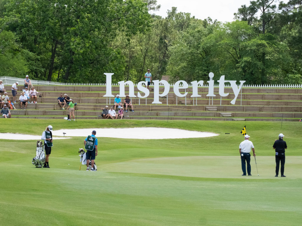 The setting behind the 18th green with the hill at Woodlands Country Club makes for a well-framed finish. (Photo by F. Carter Smith)