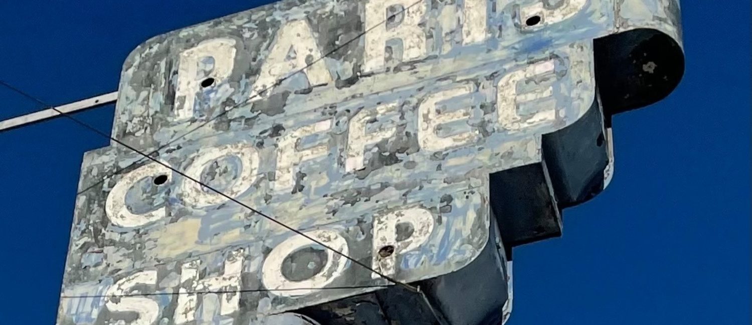 Paris Coffee Shop signage is being restored with neon.