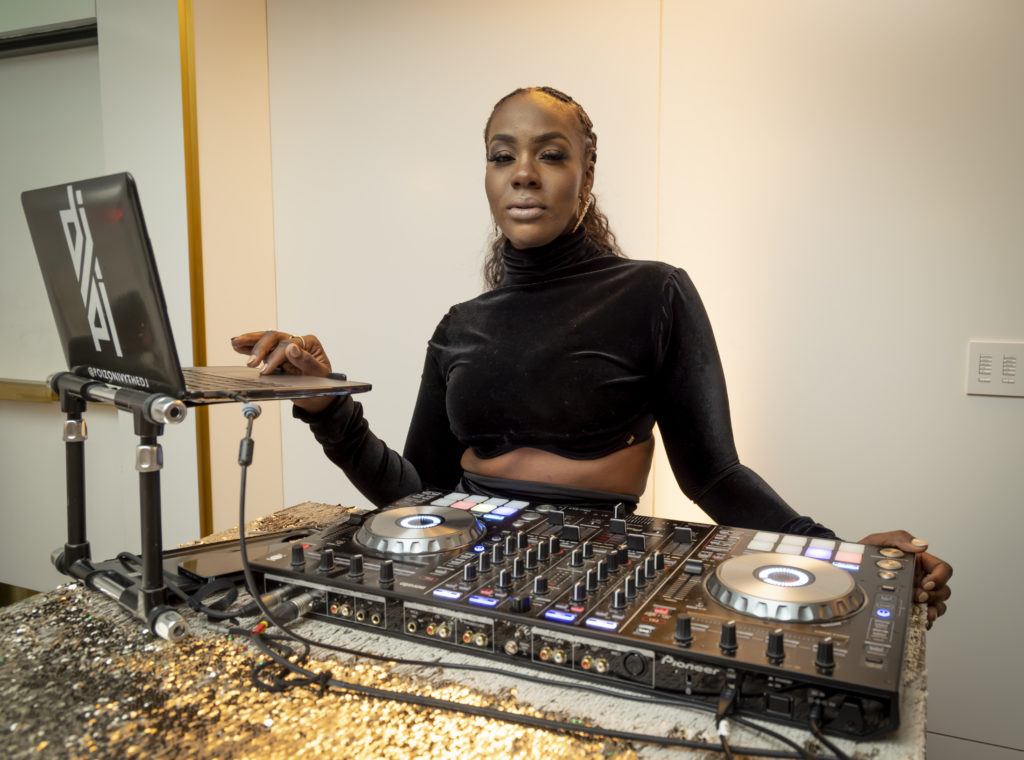 Poizon Ivy the DJ provided the beats for the after party. (Photo by Kim Leeson)