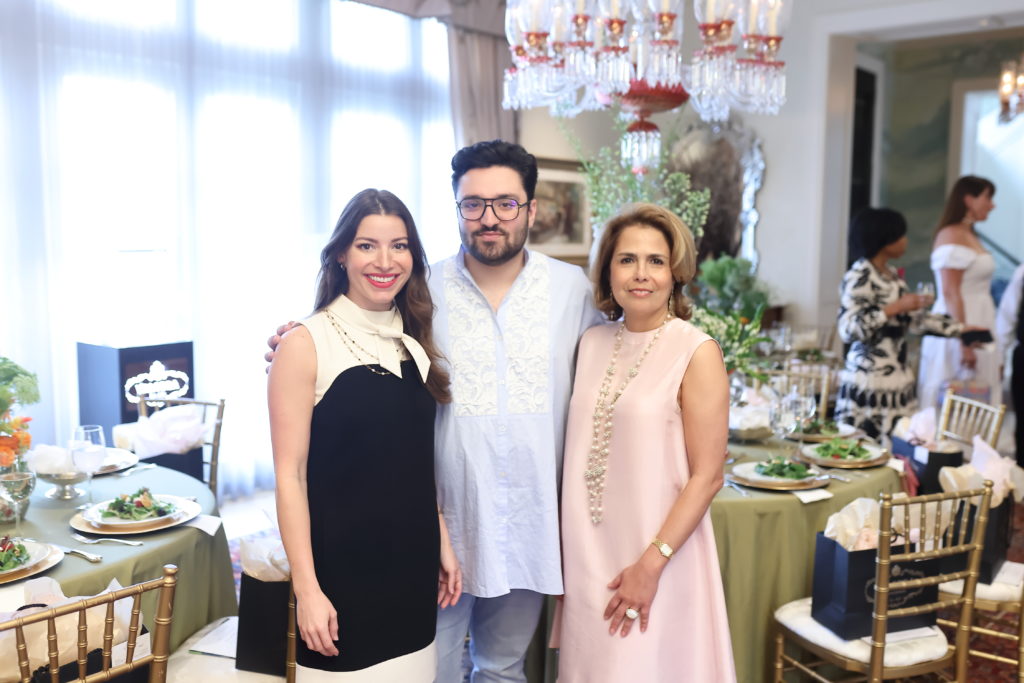 Olivia Reagan, Amir Taghi, Fariba Taghi in the Taqhi's Tanglewood home at an event 
 in HOuston April 2022. (Photo by Quy Tran)