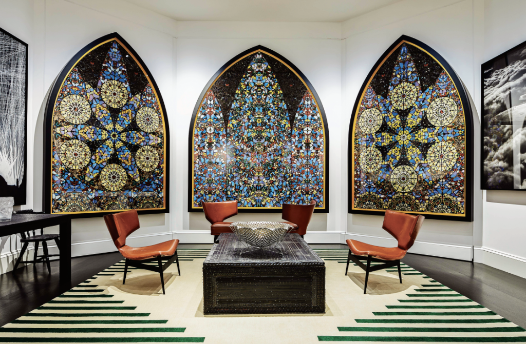 Damien Hirst’s triptych "Bringing Forth the Fruits of Righteousness from Darkness," 2008, hangs in Peter Pennoyer’s Rowdy Meadow estate project