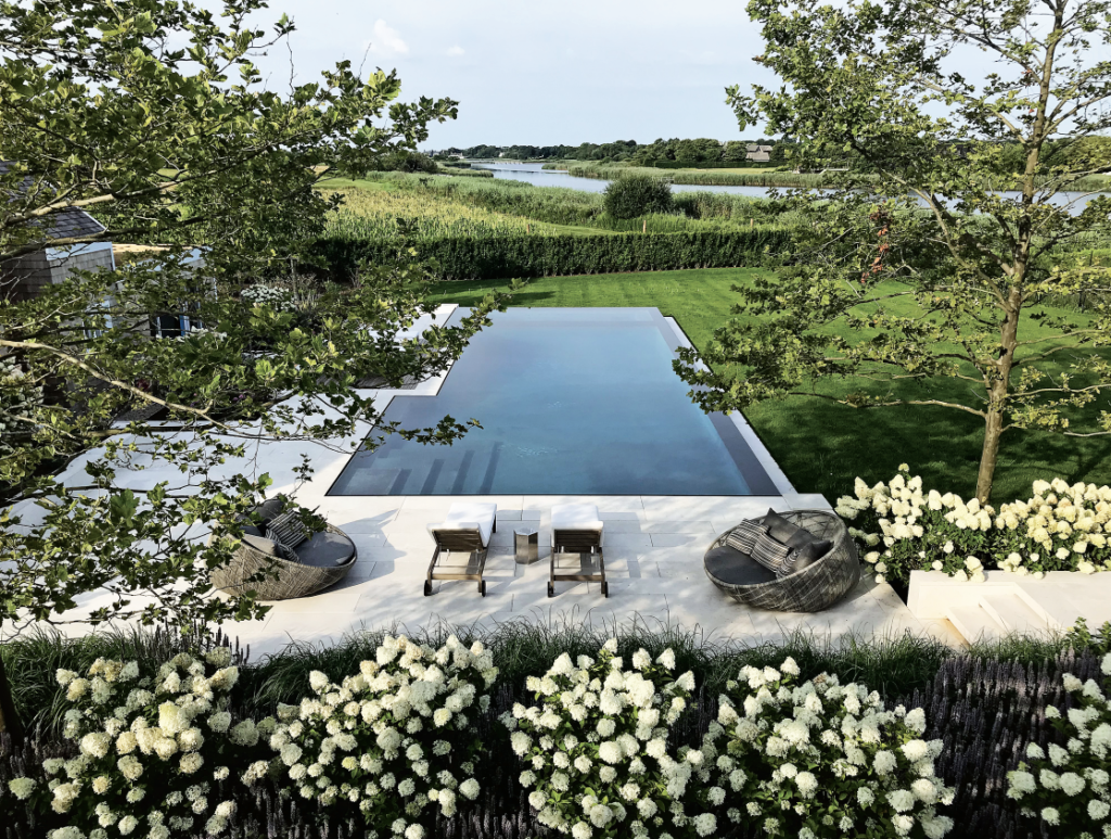 A pool and gardens in Bridge View designed by Edmund Hollander