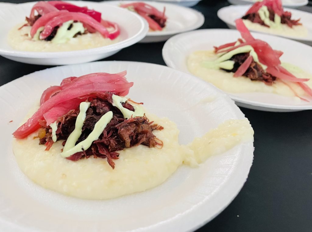 Reata's smoked tallow braised beef cheek atop redneck cheddar grits at Main Event. Photo by Courtney Dabney.