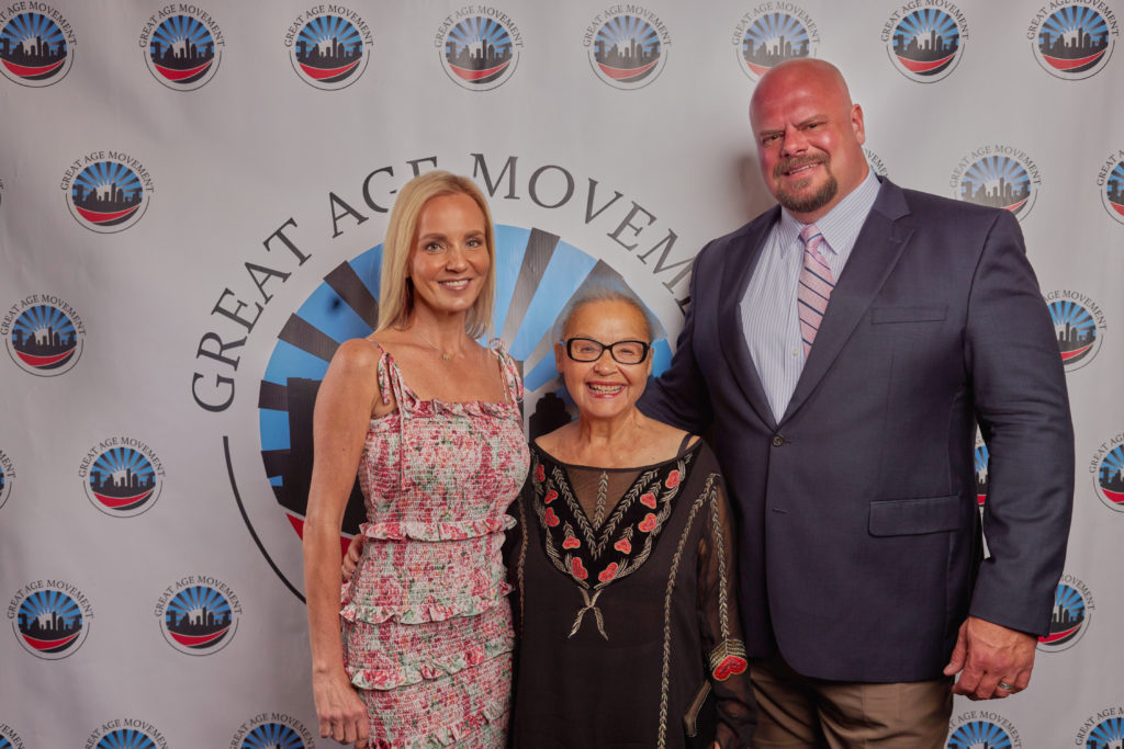 Kirin Wells, honoree Irma Galvan, Joe Wells at the Great Age Movement annual Jazz Brunch held at the Health Museum