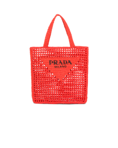 Prada raffia black tote bag, $1,690, available at Neiman Marcus NorthPark and Prada.com