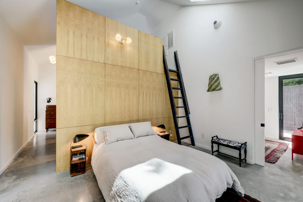 The primary bedroom at 717 East 21st St. in The Heights (Photo by TK Images)