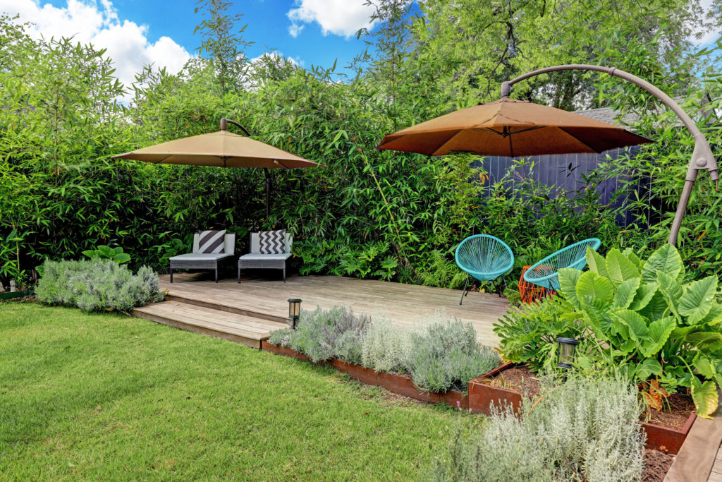 Lush gardens and decking await at 717 East 21st Street in The Heights. (Photo by TK Images)