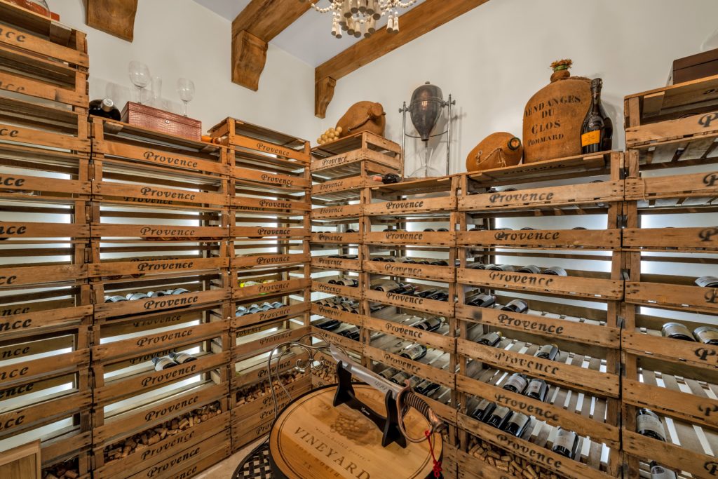French wine crates line the wine room at 2710 Simondale.