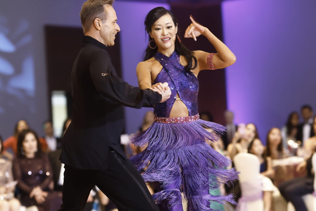 Asian Pacific American Heritage Association Dancing with the All-Stars competition winners Paul Richardson and Dr. Cindy Berthelot Ly. (Photo by Quy Trang)