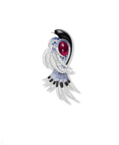 Harry Winston Blue Magpie brooch from the Marvelous Creations Collection with cabochon tourmaline, blue sapphires, rubellite, and diamonds, set in platinum.
