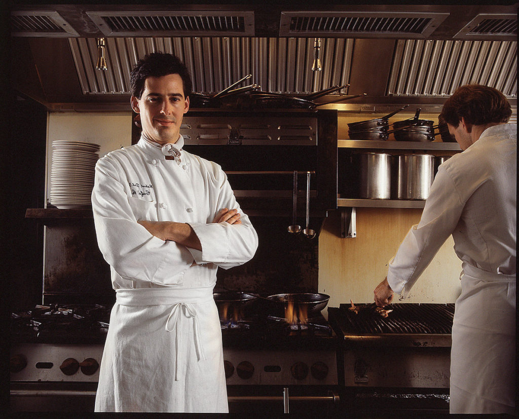 Del Grande in his Cafe Annie kitchen, 1982