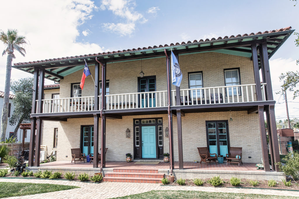 The 1931 Dr. Albert and Willie Dean Singleton House in the Monterey Revival style was designed by Houston architect Cameron Fairchild (Photo by Koby Brown Photography)