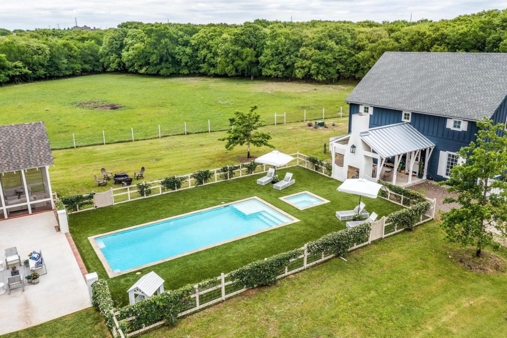 The blueberry colored guest house adds a myriad of possibilities.