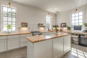 8632-S-FM-1187 – A second full kitchen makes entertaining easy at the guest home.