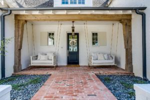 8632-S-FM-1187 – Front porch swings will sunset view add to the charm.