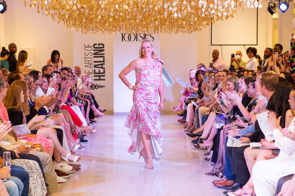 Dr. Aldona J. Spiegel on the catwalk at The Art of Healing Foundation event at Tootsies (Photo by Jacob Powers)