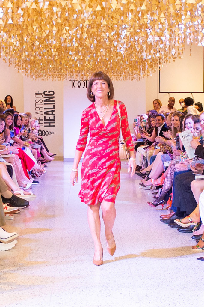 Dr. Susan Blaney on the catwalk at The Art of Healing Foundation event at Tootsies (Photo by Jacob Powers)