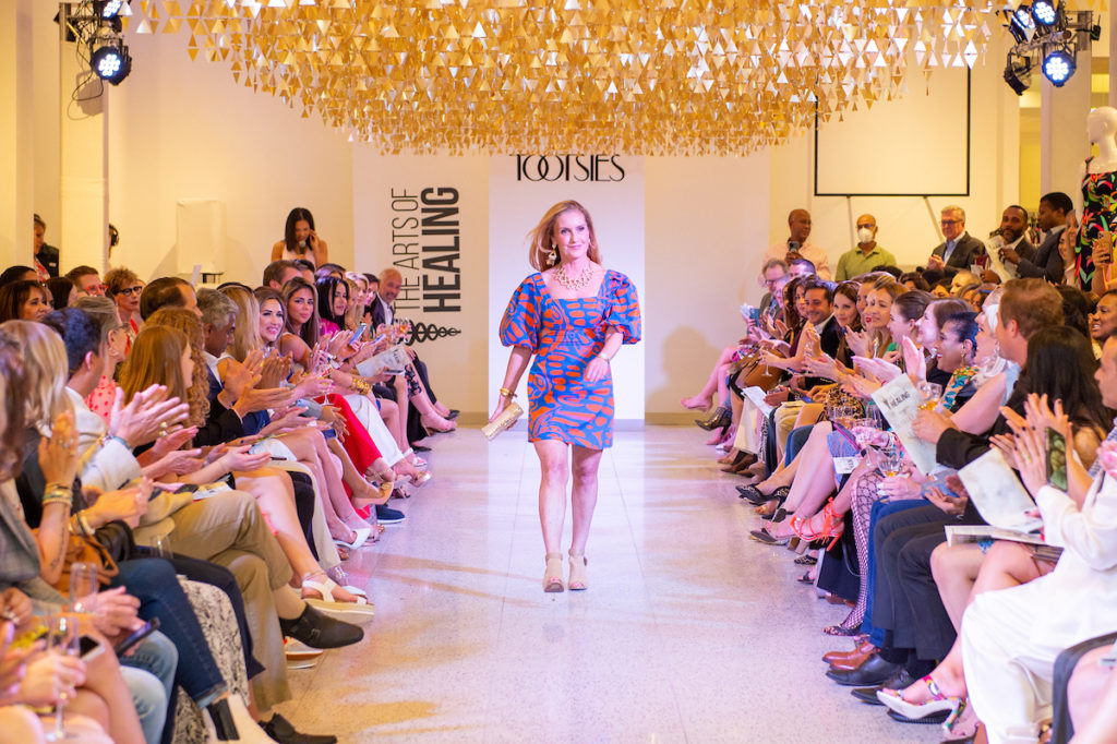 Dr. Susan Hardwick Smith on the catwalk at The Art of Healing Foundation event at Tootsies (Photo by Jacob Powers)