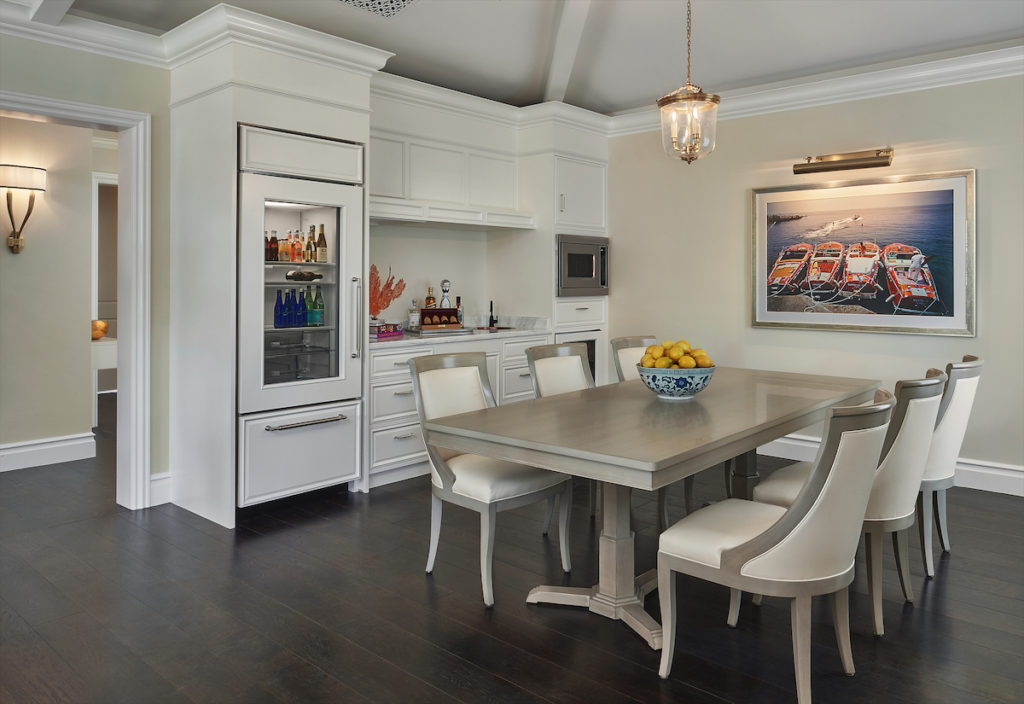 The dining room and kitchenette of a Grand Bungalow suite. 