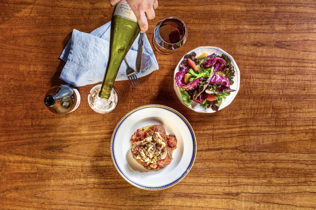 Hotel Lucine's restaurant, The Fancy will feature dishes like House meatballs with warm mussel salad, chiles and olives, salad of bitter greens and sweet citrus with meyer lemon-green tea vinaigrette (Photo by Jenn Duncan)