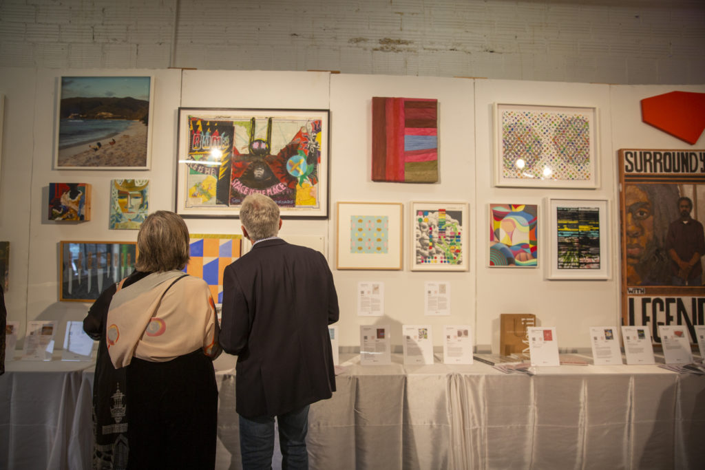 Glasstire gala goers take in the silent auction. (Photo by Jenny Antill Clifton)