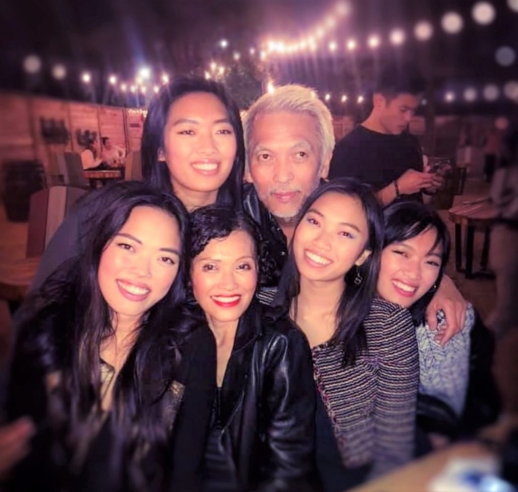 Duyen and Marc Nguyen with their four daughters.