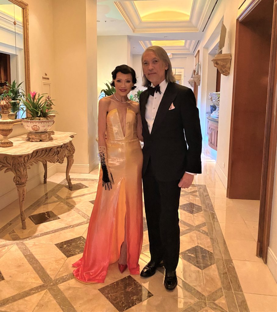 Second time Best Dressed honoree Duyen Nguyen, wearing Bach Mai,  photographed with her husband, Marc Nguyen in 2022.