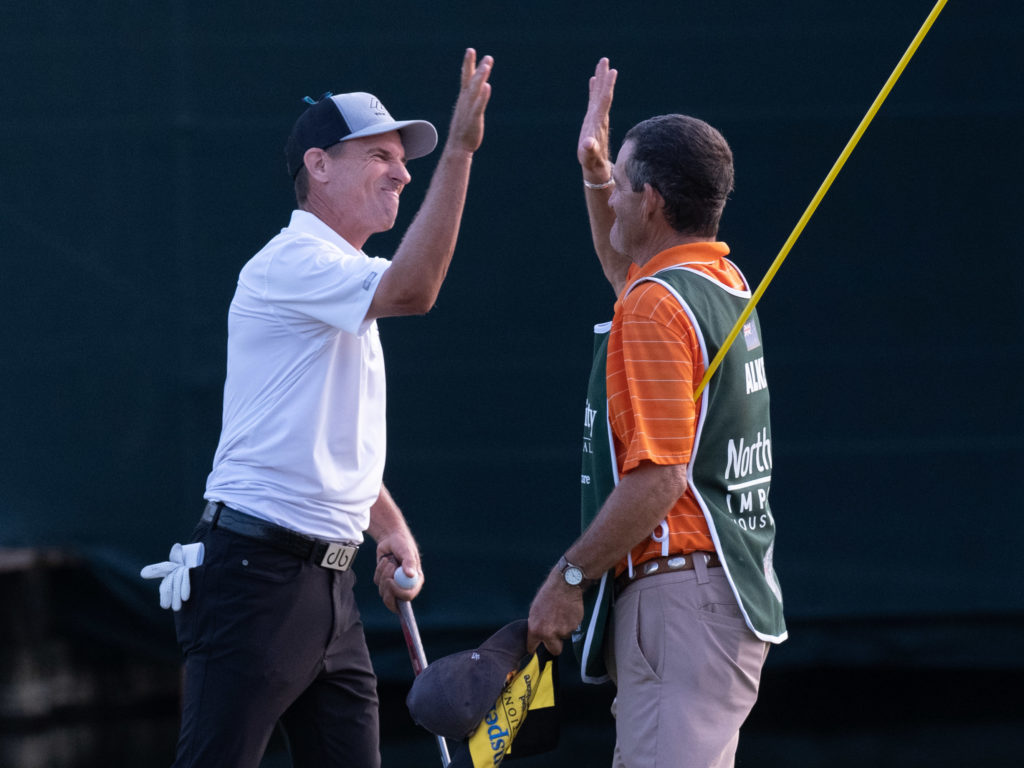New Zealand's Steven Alker and his caddie shared at moment after he won the Insperity Invitational. (Photo by F. Carter Smith)