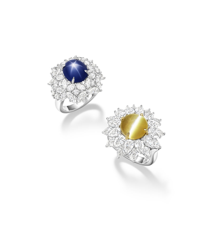 From left: Harry Winston Star Sapphire ring from the Marvelous Creations Collection with 6.82-carat oval cabochon star sapphire center stone and marquise and round brilliant diamonds, set in platinum; Cat's Eye Chrysoberyl ring with 7.60-carat cat's eye chrysoberyl and pear-shaped diamond petals, set in platinum.
