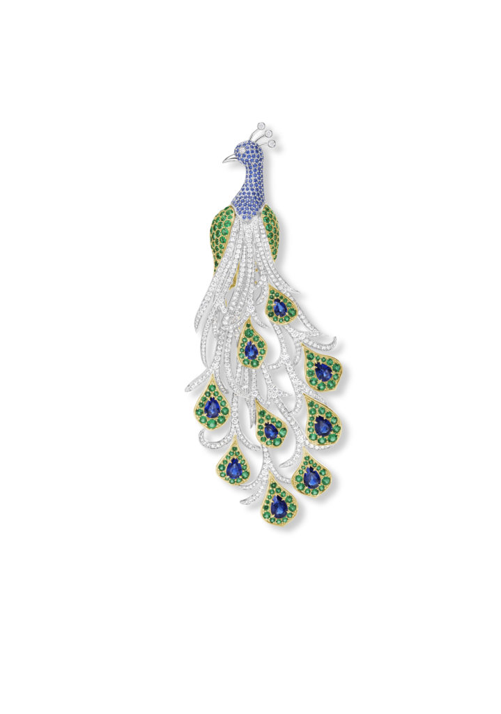 Harry Winston Peacock brooch from the Marvelous Creations Collection with emeralds, blue sapphires, and diamonds, set in 18K yellow gold and platinum.
