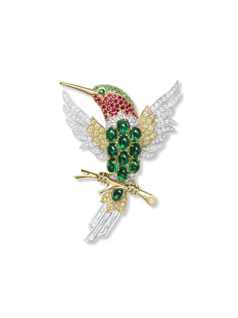 Harry Winston Hummingbird brooch from the Marvelous Creations Collection with rubies, emeralds, yellow diamonds, and diamonds, set in 18K yellow gold and platinum.