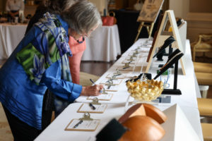 Crafting a Legacy's silent auction featured collectible jewelry and works of art created by HCCC’s current and past resident artists. (Photo by Katy Anderson)