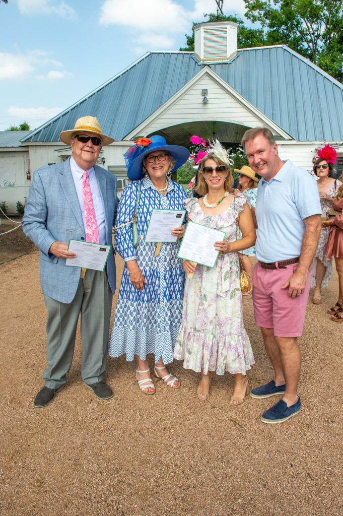 Larry & Lindy Neuhaus, Lauren & Rob Gray at the Bo's Place 'Hats, Hearts & Horseshoes' benefit at Houston Polo Club. (Photo by Jacob Power)
