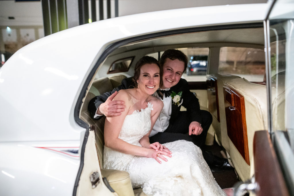 Perry Oster and Sarah Harris' wedding was a celebration. And they exited in high style. (Photo by Chris Bailey Photography)