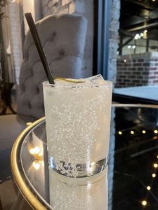 Tre – A cocktail called All Roads with a hint of bergamot. Photo by Courtney Dabney.