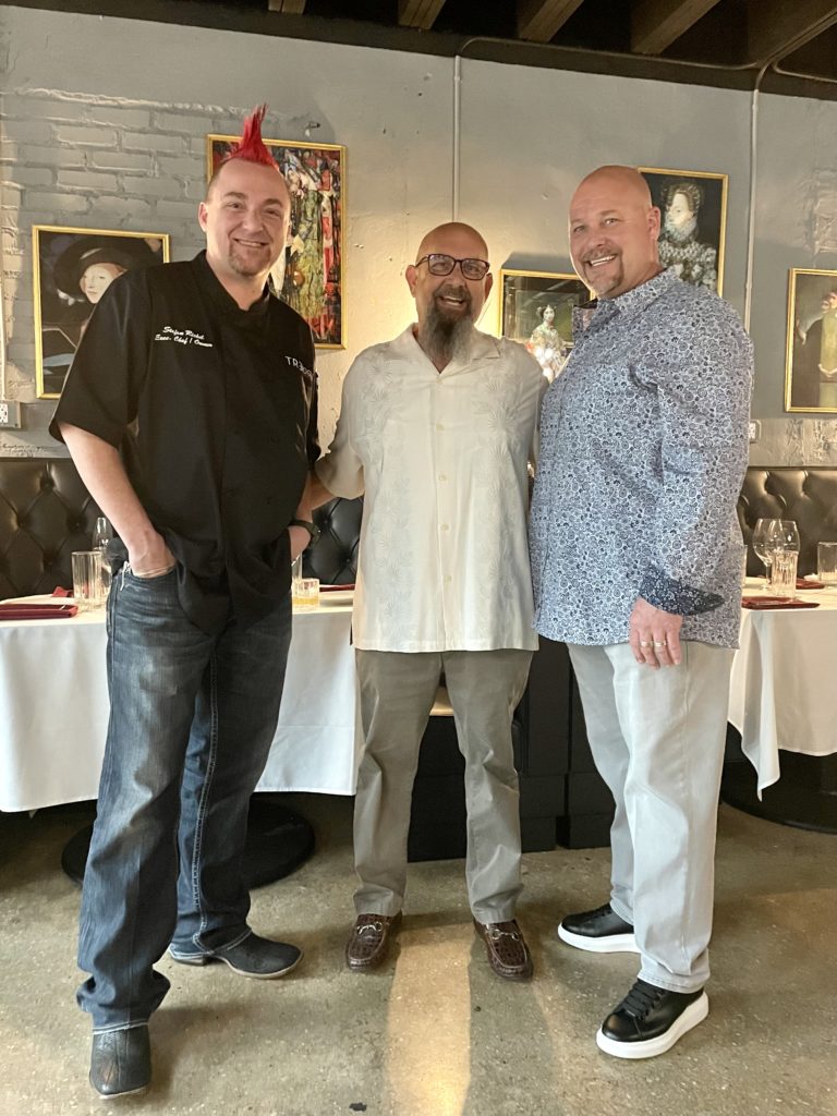 Stefon Rishel, with partners Wallace Owens and Kyle Bryson. Photo by Courtney Dabney.