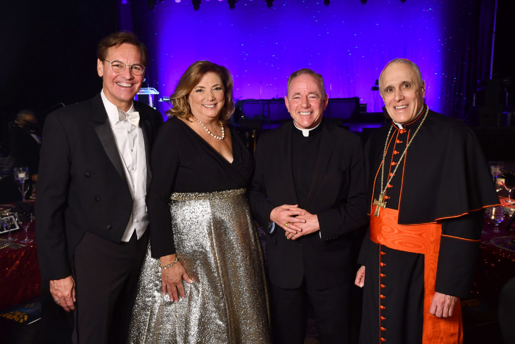 President Richard Ludwick and Melynda Ludwick with  Archbishop J. Michael Miller and Daniel Cardinal DiNardo at the University of St. Thomas 75th Anniversary Gala at the Hilton Americas Houston (Dave Rossman photo)