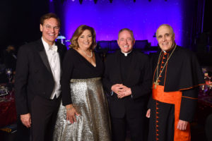 President Richard Ludwick and Melynda Ludwick with  Archbishop J. Michael Miller and Daniel Cardinal DiNardo at the University of St. Thomas 75th Anniversary Gala at the Hilton Americas Houston (Dave Rossman photo)