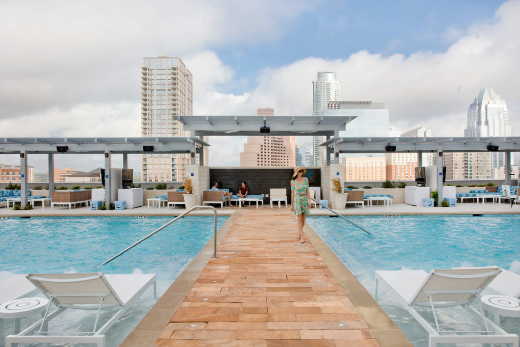 Book a VIP Cabana at the largest pool in downtown Austin. 