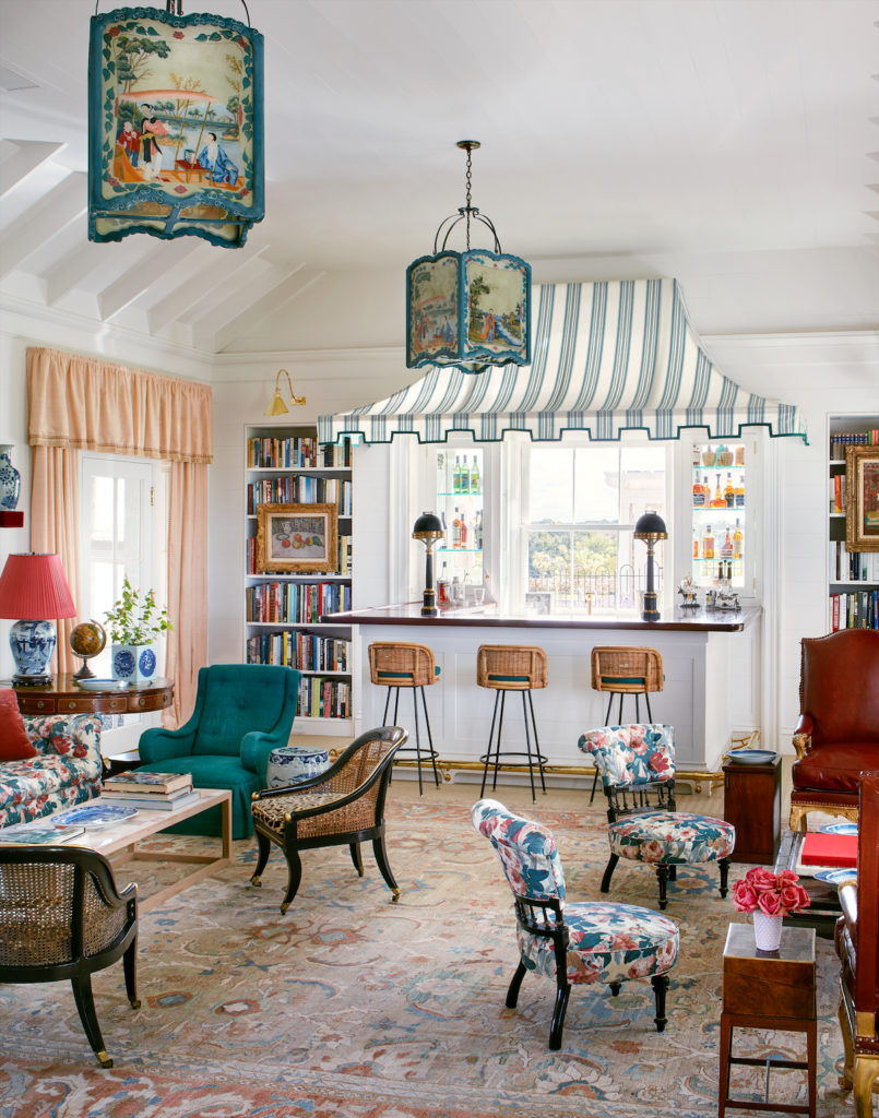 The living-room bar is tented with Brunschwig & Fils stripe fabric. Custom-painted lanterns from John osselli Antiques. (Photo by Trevor Tondro and Otto )