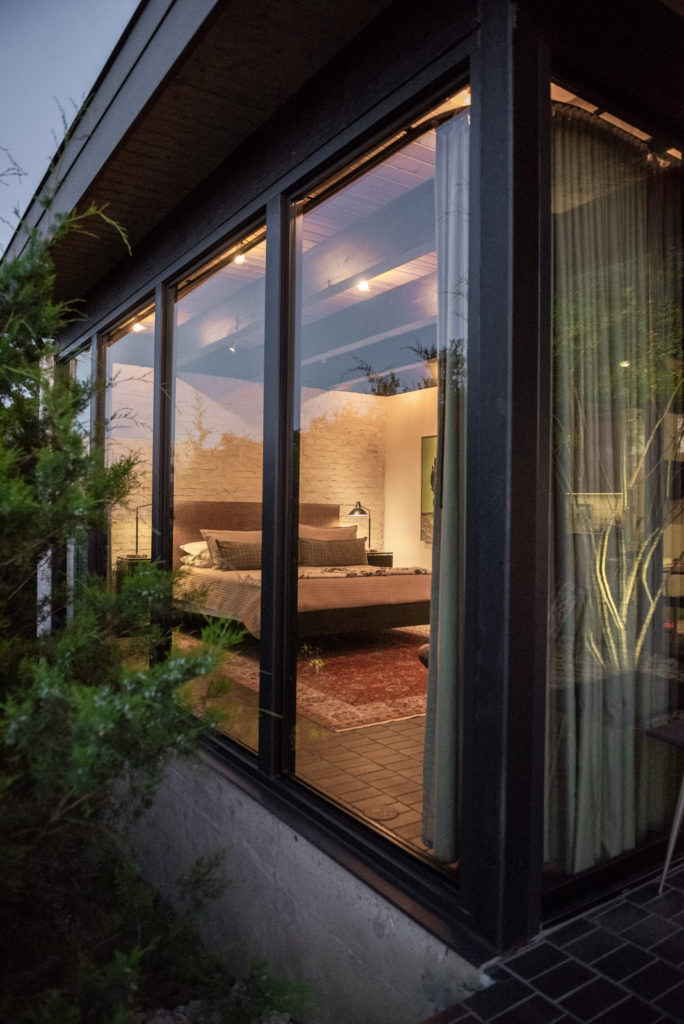 The main bedroom suite includes an entry vestibule that opens onto a patio. (Photo by Stephen Karlisch and Robert Tsai)