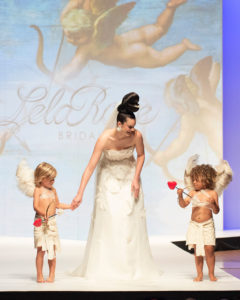 A dreamy bridal moment provided by Lela Rose (Photo by Tamytha Cameron)